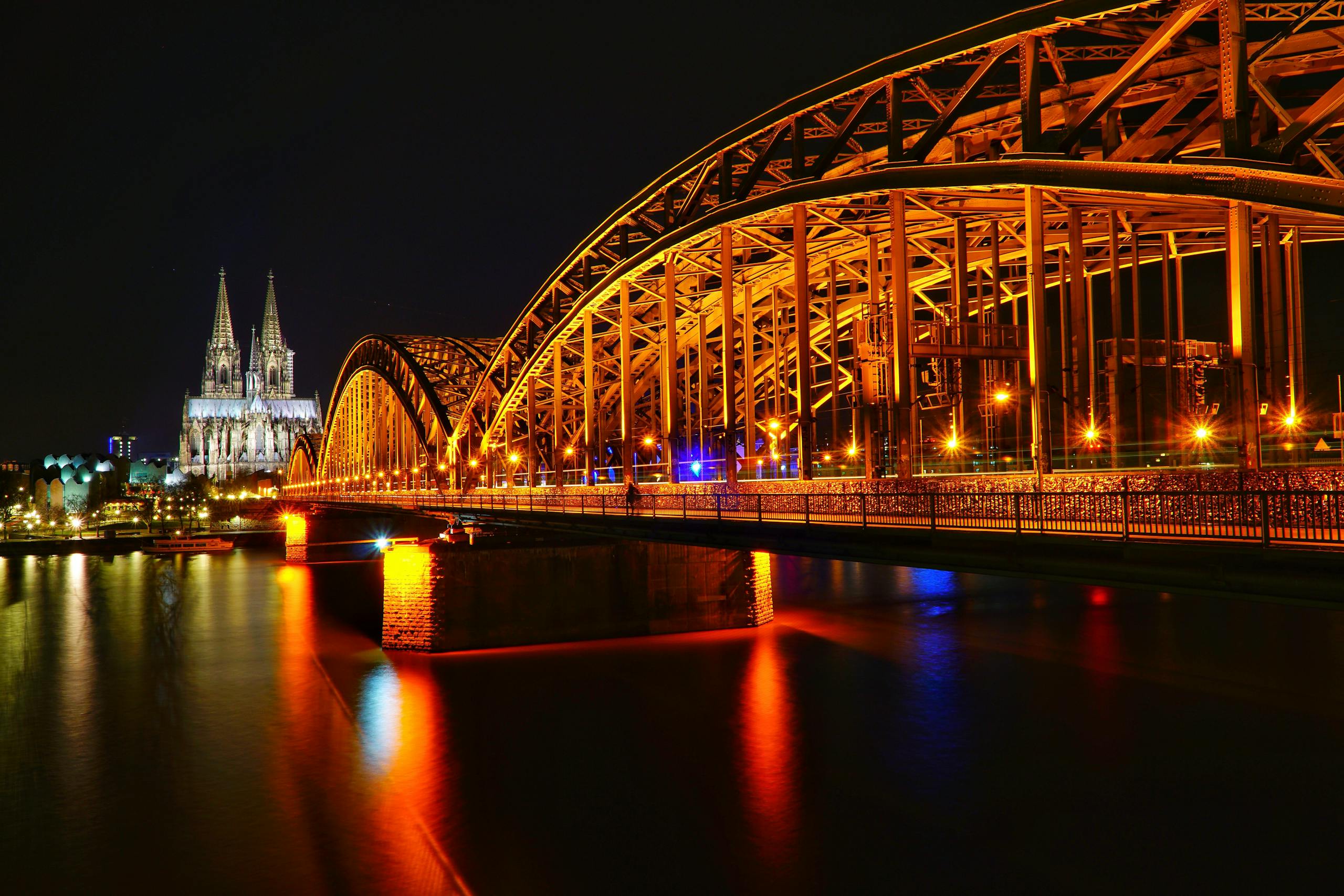 Lighted Bridge and View of Church at Nighttime